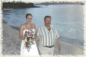 walking the bride down the beach at Honeynmoon