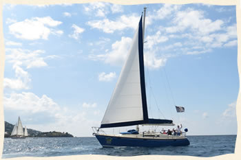 Wedding couple bow of sailboat Virgin Islands